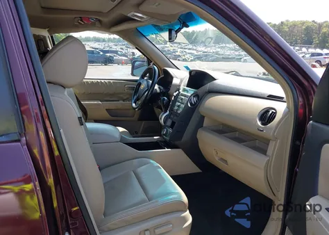 2009 Honda Pilot Touring z USA, uszkodzony, nr VIN 5FNYF48989B046752